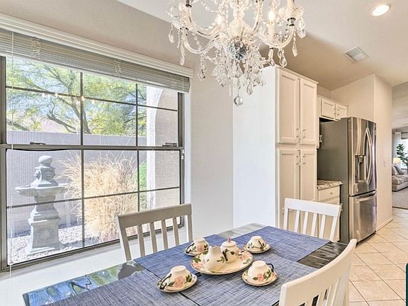 Eat in kitchen, coffee area, new ss refrigerator, overlooking front garden.