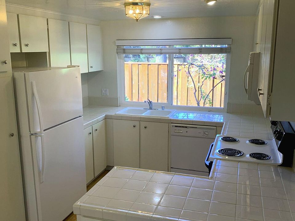 Check out the updated kitchen with updated refrigerator and appliances