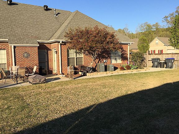 Spacious backyard with fence