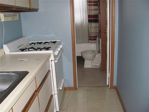 kitchen leading to bathroom