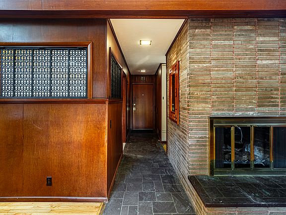Vermont slate tile and Roman brick fireplace
