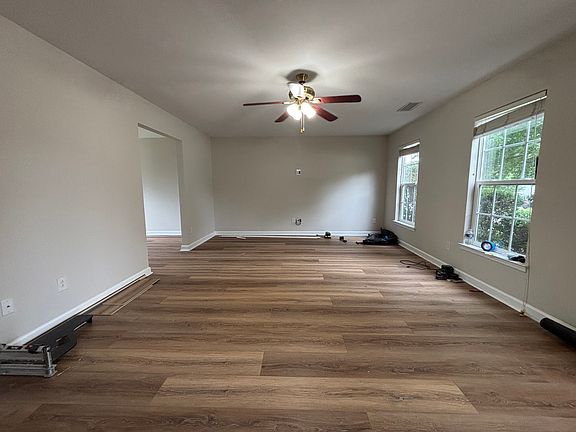Brand new wide luxury vinyl plank flooring is currently being installed throughout much of the home.
