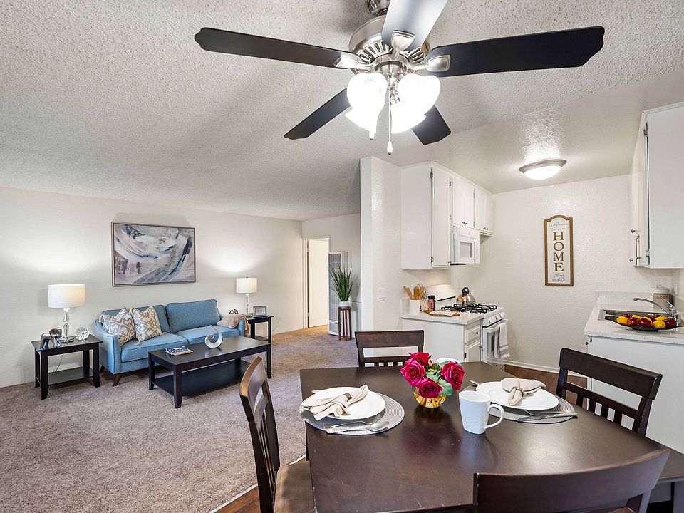 Inviting open-concept living space with modern furnishings and a bright, welcoming atmosphere.