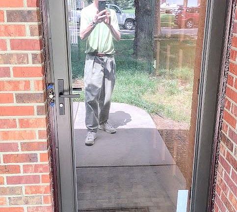 New security storm door recently installed having lock and key. Main door has keypad lock system.
