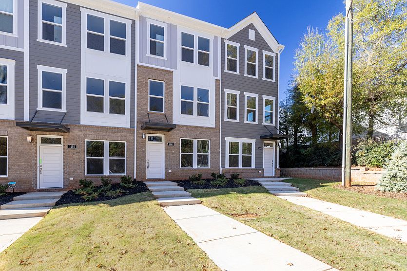 Evans Exterior 8 Features Siding, Covered Front Door, and Rear 2-Car Tandem Garage