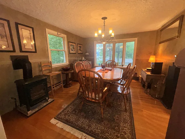Formal Dining Room with a gas fireplace