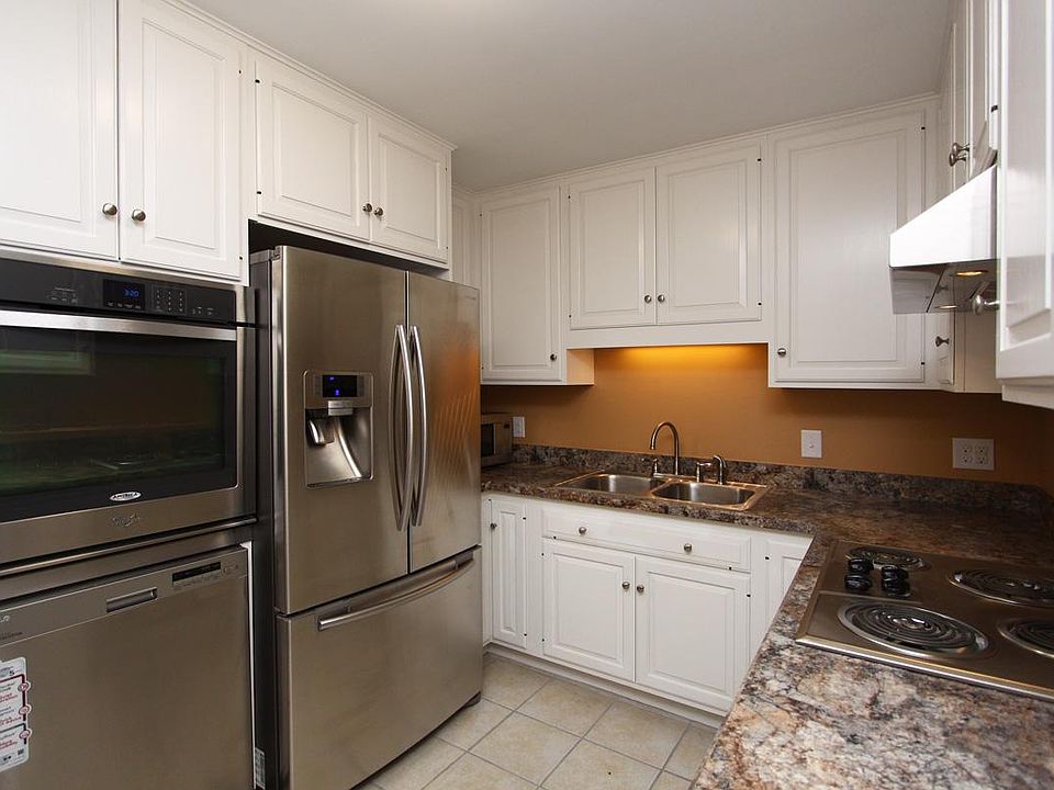 Kitchen with stainless steel appliances.