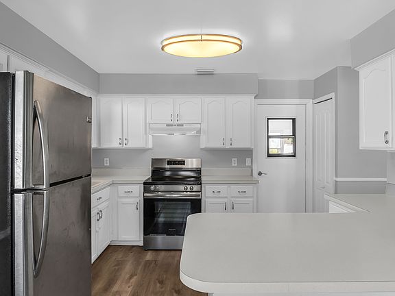 Spacious kitchen with stainless steel appliances