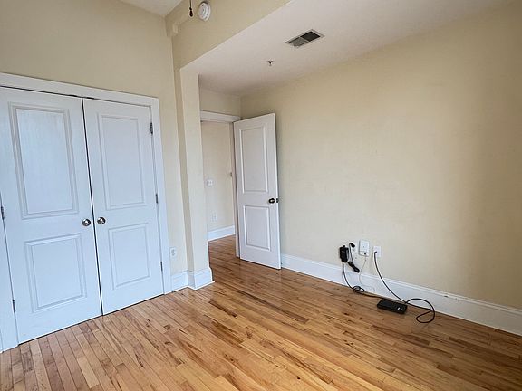 Bedroom with double door closet