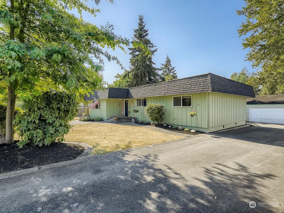 Welcome to 9422 with the long driveway and detached 2 car garage PLUS SHOP!>