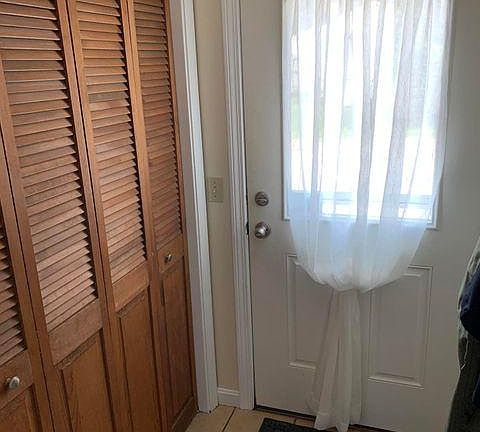 Mudroom entry with closet