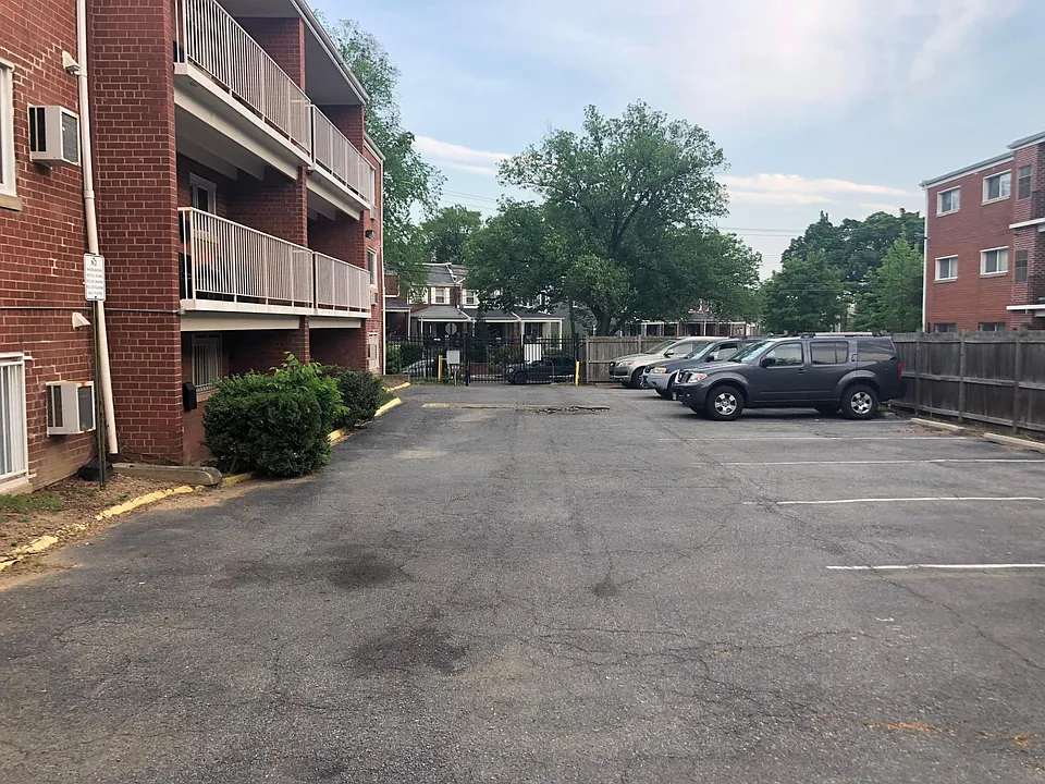 Back of the building where parking spot is gated