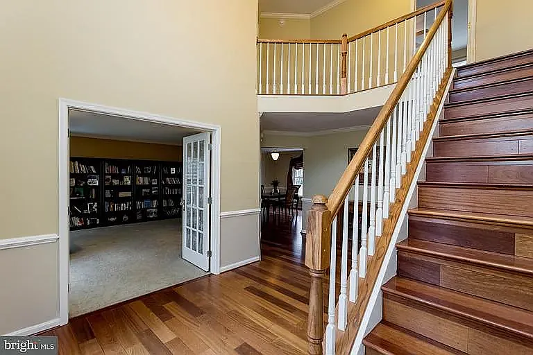 Another view of the center hallway and steps. Everything you see here has been repainted