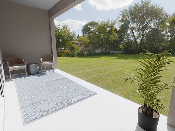 Your interior opens to outdoor living space on a large covered lanai Artist s rendering