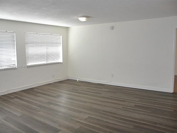 3rd image of 9971 W Bay Harbor Dr APT 105