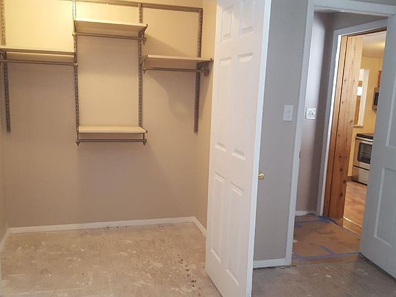 Double closet with french doors in Master bedroom