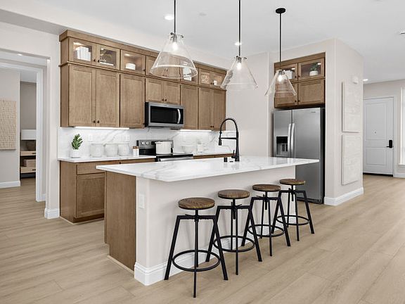 Kitchen with stacked cabinets