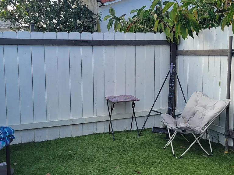 This is your private fenced in yard accessed through the Kitchen door