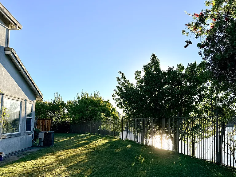 Spacious backyard with lake views