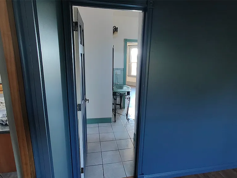 view into bathroom from 2nd bedroom