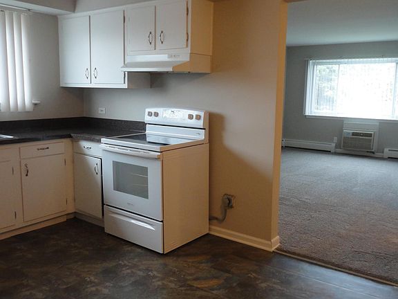 Kitchen facing living room.