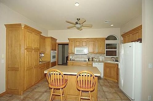 Kitchen features spacious cabinet & counter space.