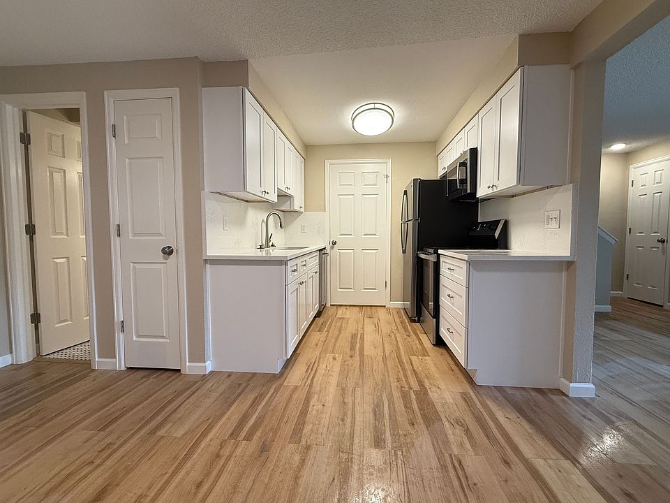 updated with quartz countertops, new appliances, and cabinetry