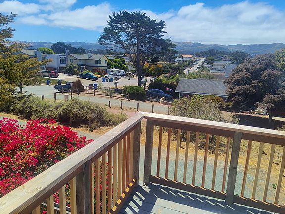 View of bike trail from living room/kitchen balcony