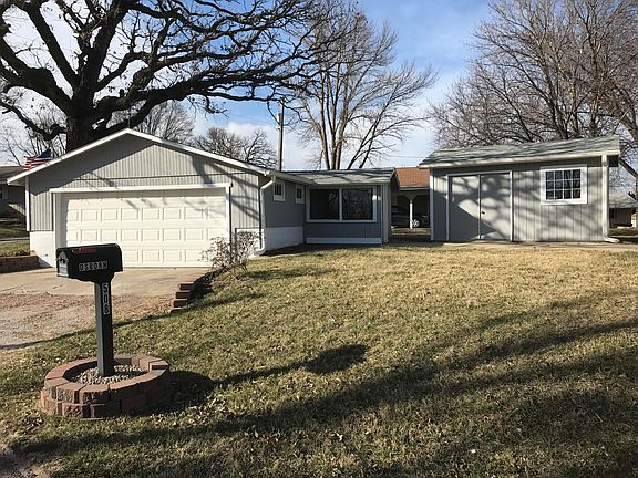 Garage, outbuilding, & patio