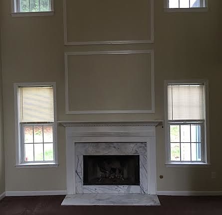 Fireplace in 2 story living room