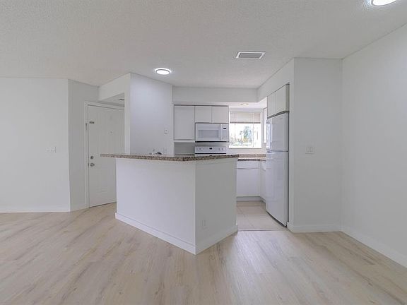 3rd image of 3350 Pinewalk Dr N APT 1418