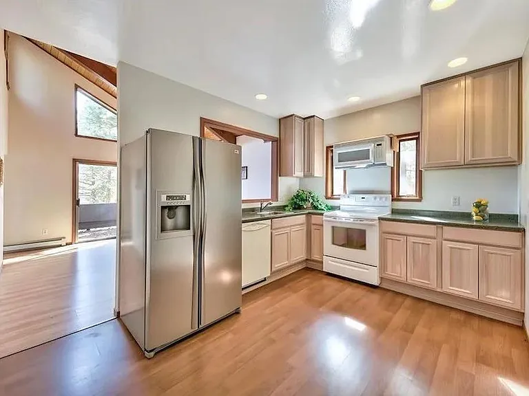 Clean kitchen stocked with everything you need to cook for the family.