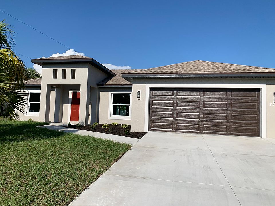 Front with 2 car garage