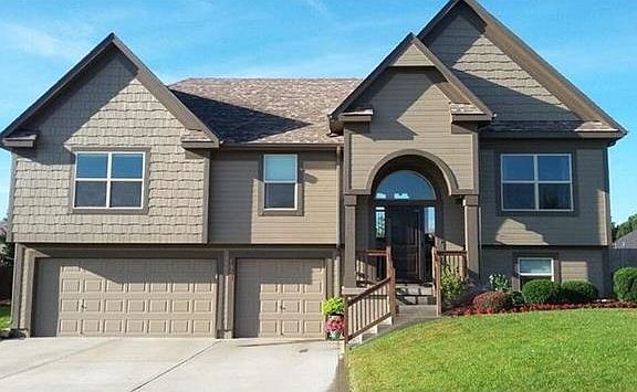 1903 Kimberly Lane, Greenwood, MO....watch for the heart-shaped plant when you enter the front door.