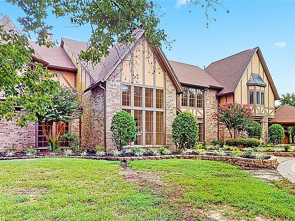 Many Updates to this STUNNING Home! Recent roof, flooring, carpet, fixtures, interior paint and landscaping.