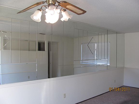 designer mirrored wall brings in additional light