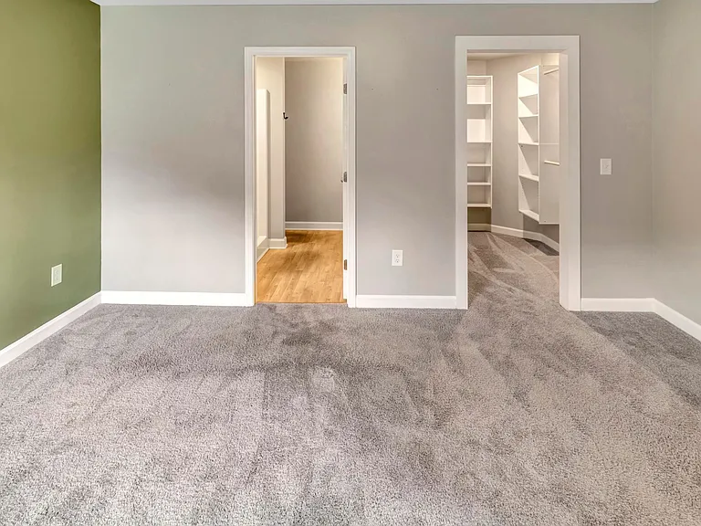 From the Primary Bedroom, the Primary Bathroom and Walk-In Closet are Amazing!