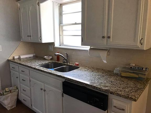 Updated counters and painted cabinets.