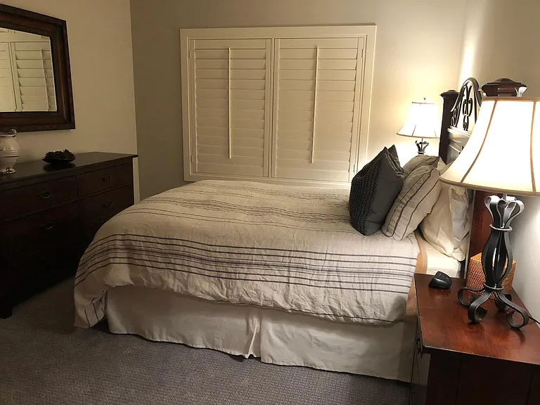 Second bedroom, queen size bed, Located on main level of condo.