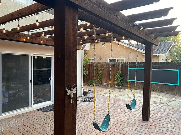 Pergola swings & chalkboard