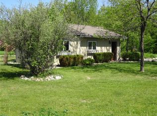 7711 Hoiles Dr NW, Williamsburg, MI 49690