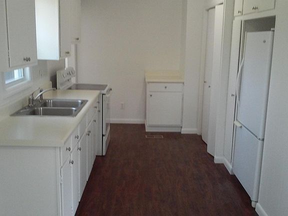 Lots of kitchen storage and a mud/laundry room leading to th