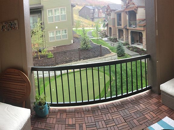 Teak decking on balcony with comfortable seating