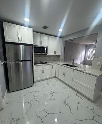 3rd image of 1171 NE 161st St