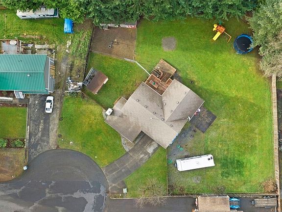 Grab this rare opportunity to enjoy all the indoor & outdoor space you could need! Run a day care or business, or just enjoy the property as your own lovely homestead! 