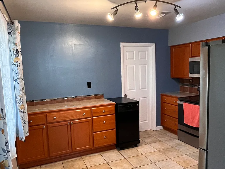 Note: the black appliance in this photo (a dishwasher) is not included in the rental.