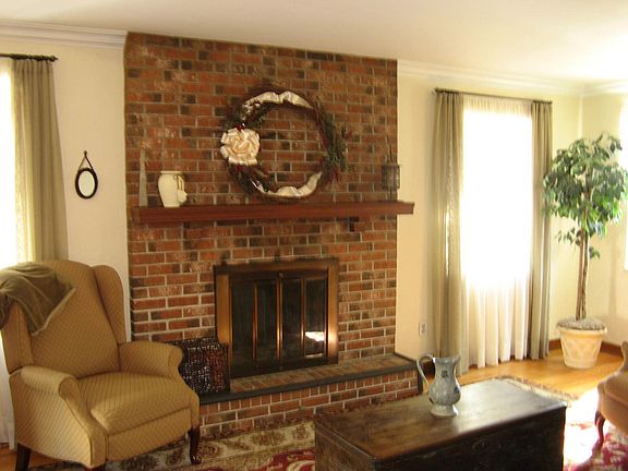 Beautiful log burning fireplace with gas starter