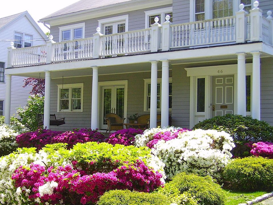 Front elevation: Beautiful Landscaping of Azealas and 