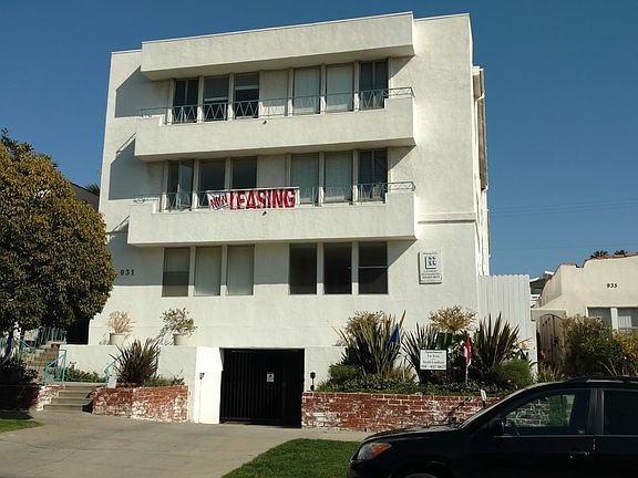 Euclid St front. Unit # 201 on the left with sign.