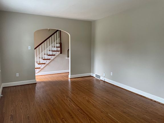 Living Room (stairwell in entry foyer leads to unfinished attic space, not heated nor cooled)